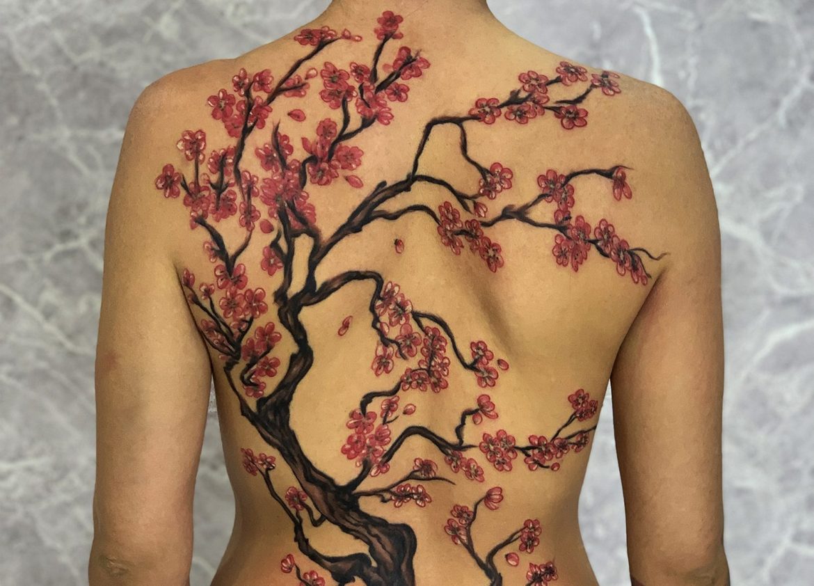 cherry blossom tattoo by mukesh waghela at moksha tattoo studio goa india